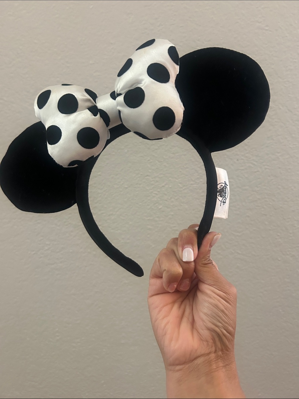 Disney Black Minnie Ear Headband with White Polka Dot Bow